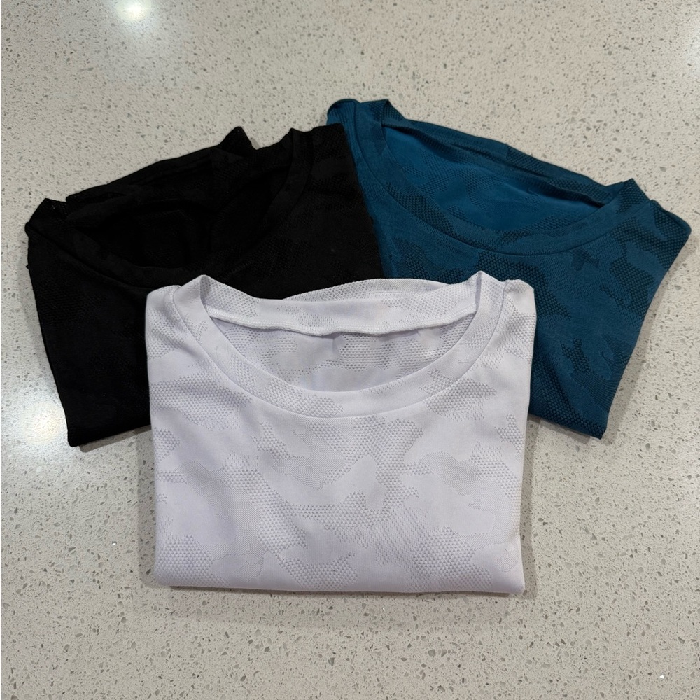 Set of Three T-Shirts in Black, White, and Teal